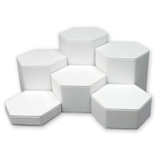 White leatherette hexagonal display set of 6 pieces ranging 1.25 to 6.25 inch tall
