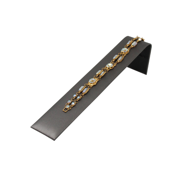 Slate grey leatherette small ramp display 8 inch wide 2.125 inch tall angled