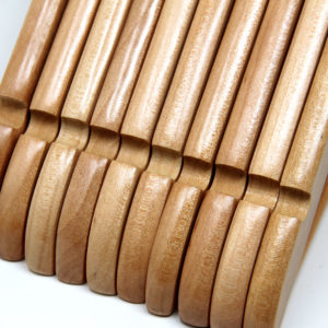 HW01 series wood dress hanger showing notched shoulders for straps