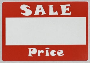 Sale price adhesive tags for retail markdown and clearance pricing