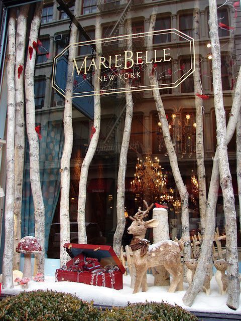 Marie Belle's warm and inviting New York winter window:​