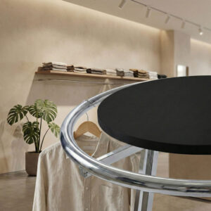 30 inch black round melamine shelf underside showing mounting hardware