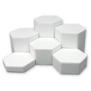 White leatherette hexagonal display set of 6 pieces ranging 1.25 to 6.25 inch tall